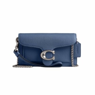 Blue leather handbag with silver chain strap.
