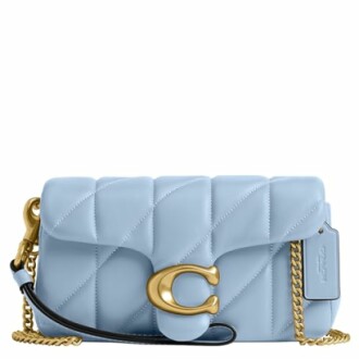 Light blue quilted handbag with gold chain and clasp