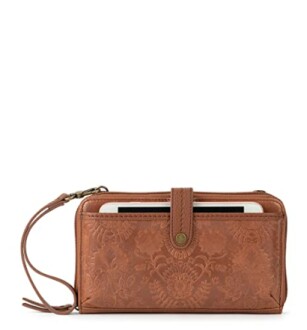 Brown leather wallet with embossed floral pattern and wrist strap