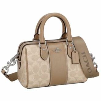 Beige Coach handbag with shoulder strap