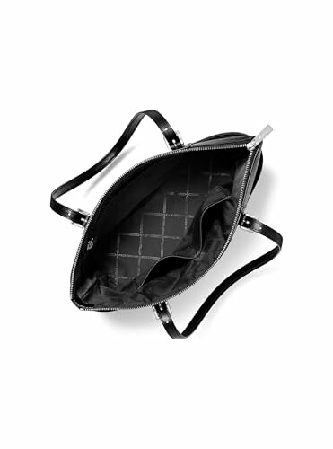 Open black handbag with visible interior lining and zipper.