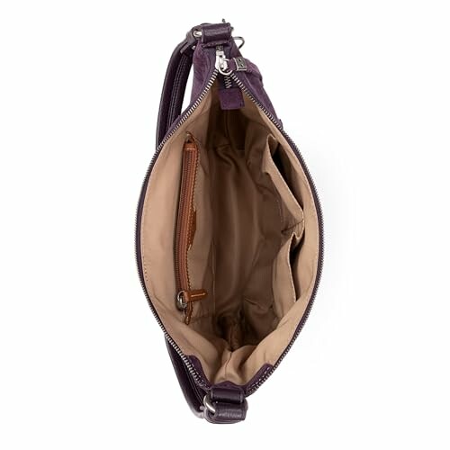 Top view of an open purple leather handbag showing interior compartments.