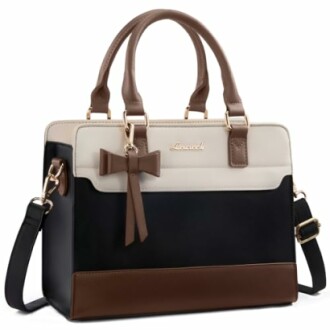 Stylish women's handbag with brown, black, and beige colors featuring a bow accent.